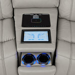 Velocity wedge console close-up showing touchscreen controls, wireless charging pad and illuminated dual cupholders