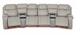 Velocity light grey home theatre seating front view with extended footrests, illuminated consoles and base lighting
